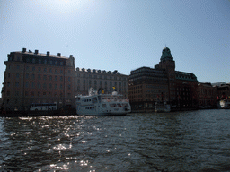 Boats in the Nybroviken bay and buildings in the Nybrokajen street, viewed from the Saltsjön ferry