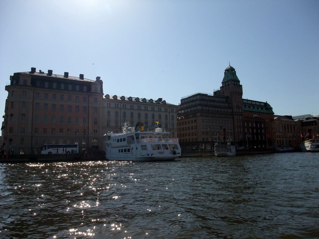 Boats in the Nybroviken bay and buildings in the Nybrokajen street, viewed from the Saltsjön ferry