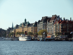 Boats in the Saltsjön bay, the Royal Dramatic Theatre and buildings in the Strandvägen street, viewed from the Saltsjön ferry