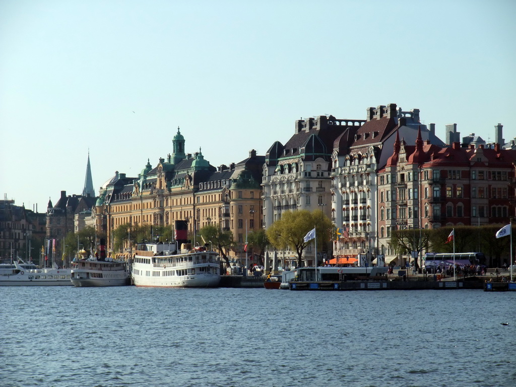 Boats in the Saltsjön bay, the Royal Dramatic Theatre and buildings in the Strandvägen street, viewed from the Saltsjön ferry