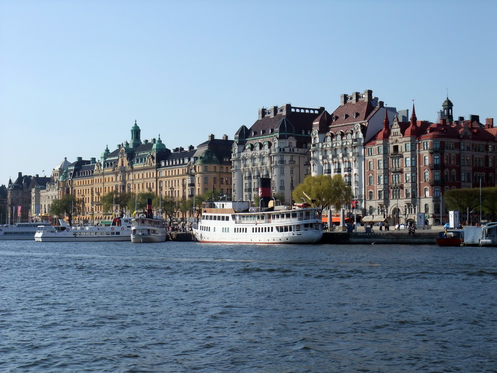 Boats in the Saltsjön bay, the Royal Dramatic Theatre and buildings in the Strandvägen street, viewed from the Saltsjön ferry