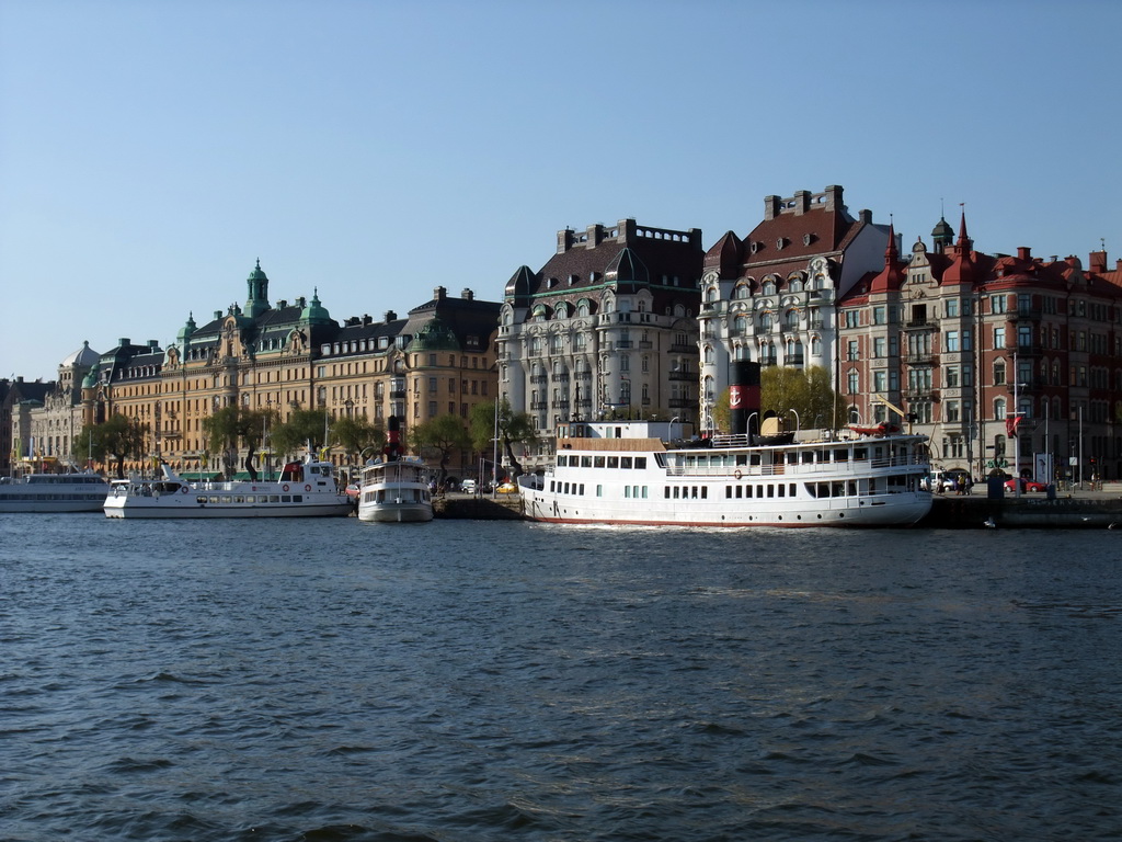 Boats in the Saltsjön bay, the Royal Dramatic Theatre and buildings in the Strandvägen street, viewed from the Saltsjön ferry