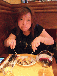 Miaomiao having dinner in the Zink Grill restaurant in Biblioteksgatan street