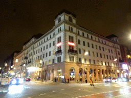 Southeast side of the Scandic Grand Central hotel at the crossing of the Kungsgatan and Vasagatan streets, by night