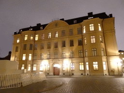 Building at the southwest side of the Slottsbacken square, by night