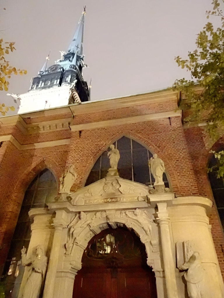 Southeast facade and tower of the German Church, viewed from its garden, by night