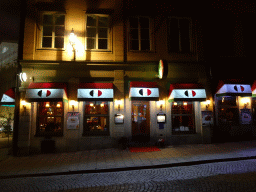 Front of the Da Peppe restaurant at the Storkyrkobrinken street, by night