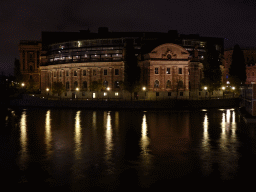 The Parliament House and the Norrström river, viewed from the Vasabron bridge, by night
