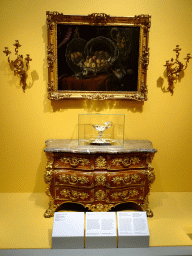 Painting `Silver Tureen with Peaches` by Alexandre-François Desportes, a chest with marble top and an ewer and dish by Christian Precht at the 1720-1770 exhibition at the Top Floor of the Nationalmuseum, with explanation