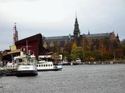 Boats in the Stockholms Ström river, the Vasa Museum and the Nordic Museum, viewed from the Kastellholmsbron bridge