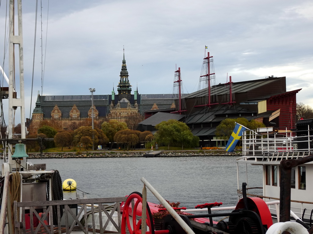 Boats in the Stockholms Ström river, the Nordic Museum and the Vasa Museum, viewed from the Östra Brobänken street at the Skeppsholmen island