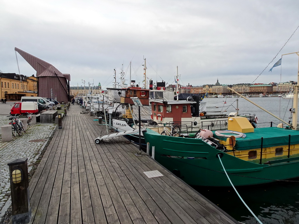 Boats at the docks at the Östra Brobänken street at the Skeppsholmen island