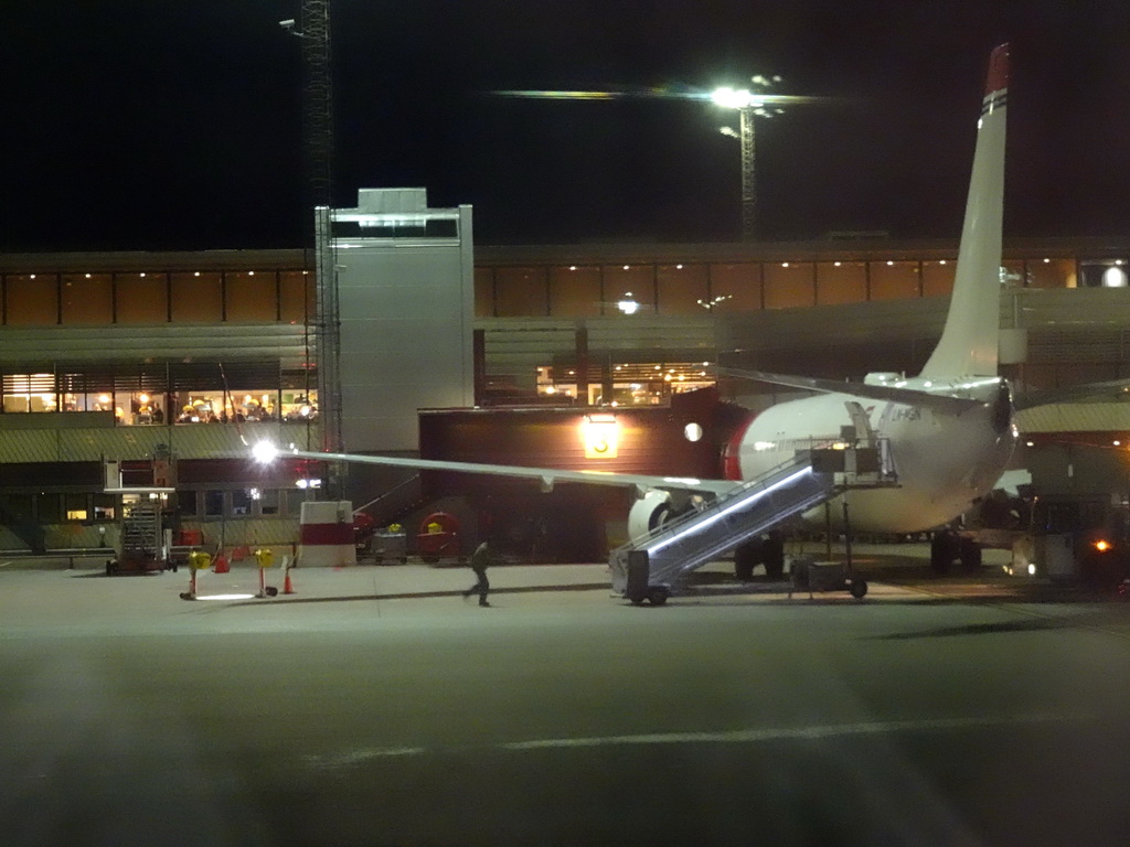 Airplane at Stockholm Arlanda Airport, viewed from Tim`s airplane to Amsterdam, by night