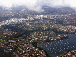 Boats in the Lane Cove River and skyscrapers at North Sydney, viewed from the airplane from Cairns