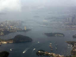 Snails Bay, Goat Island, Berrys Bay, Lavender Bay, McMahons Point, Walsh Bay, the Sydney Harbour Bridge, the Sydney Opera House and skyscrapers in the city center, viewed from the airplane from Cairns
