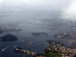 Snails Bay, Mort Bay, Goat Island, Lavender Bay, McMahons Point, Walsh Bay, the Sydney Harbour Bridge, the Sydney Opera House and skyscrapers in the city center, viewed from the airplane from Cairns