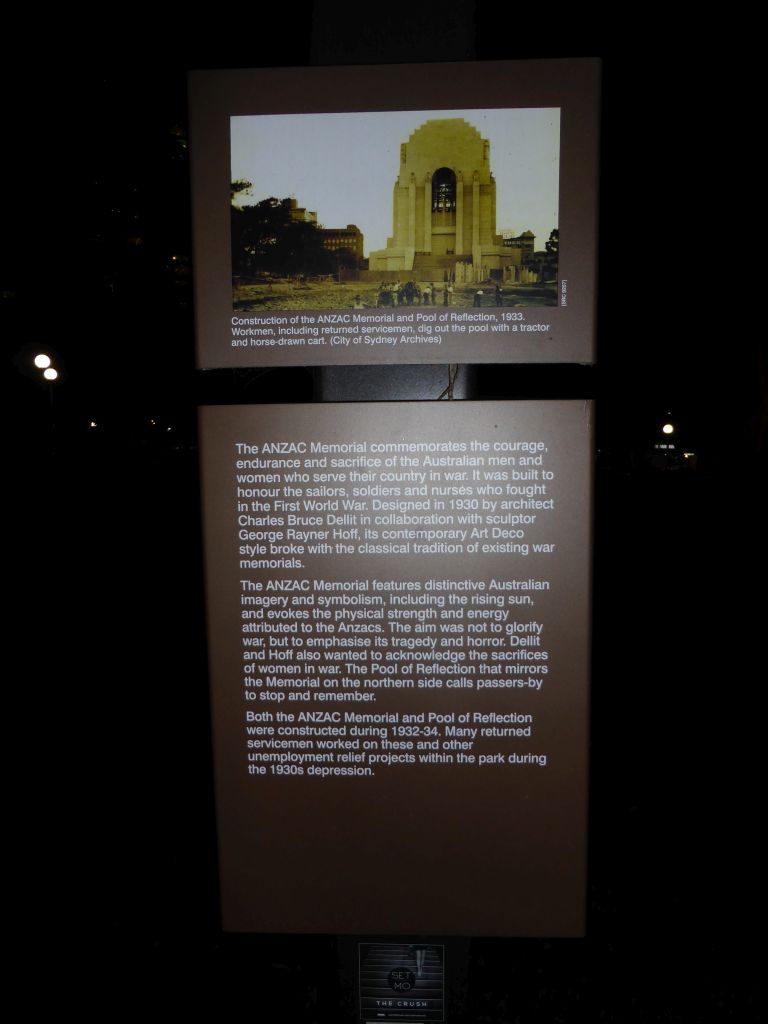 Information on the ANZAC War Memorial at Hyde Park, by night
