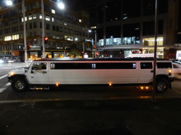 Limousine at the crossing of Elizabeth Street and Liverpool Street, by night