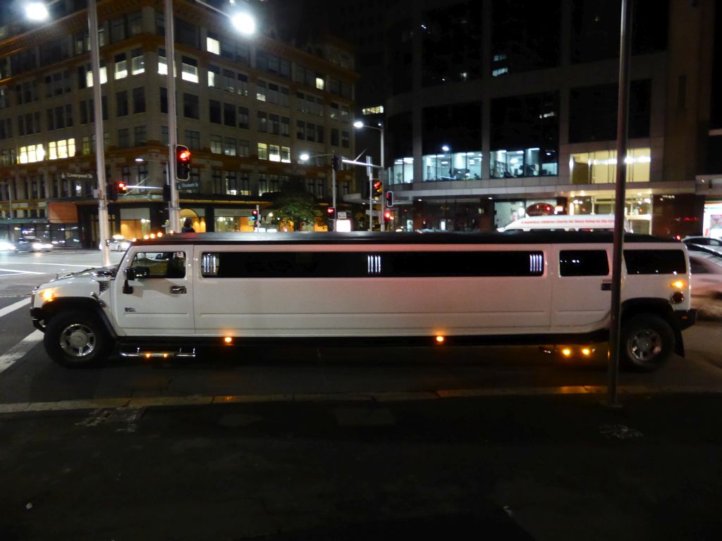 Limousine at the crossing of Elizabeth Street and Liverpool Street, by night