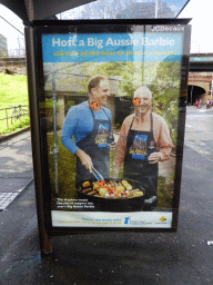 Commercial poster on the Big Aussie Barbie at a bus stop at Eddy Avenue
