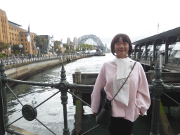 Miaomiao at the Circular Quay Wharf, with a view on the Sydney Cove and the Sydney Harbour Bridge