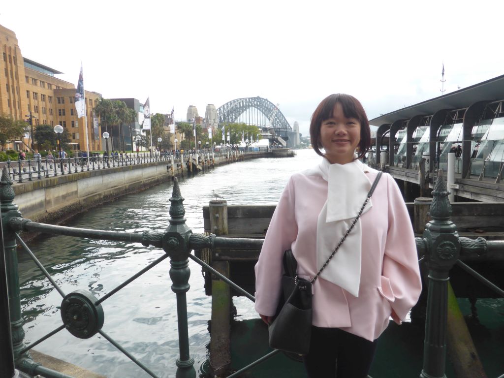 Miaomiao at the Circular Quay Wharf, with a view on the Sydney Cove and the Sydney Harbour Bridge