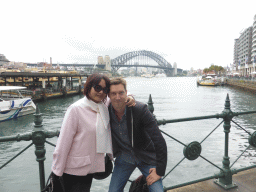 Tim and Miaomiao at the Circular Quay E street, with a view on the Sydney Cove and the Sydney Harbour Bridge