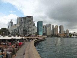 The Sydney Cove, the Circular Quay Wharf and skyscrapers at the city center, viewed from the Lower Concourse of the Sydney Opera House