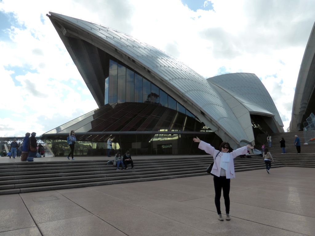 Miaomiao in front of the Bennelong Restaurant building of the Sydney Opera House