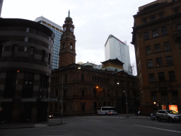 The New South Wales Department of Planning & Infrastructure building with Sydney`s first clock tower, at the crossing of Bent Street and Loftus Street, at sunset