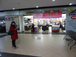 Miaomiao in front of a Chinese supermarket at the Market City shopping mall