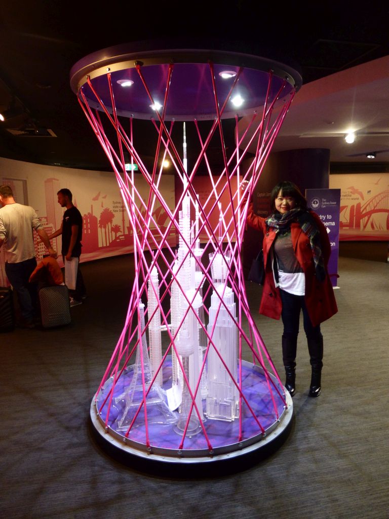 Miaomiao with scale models of famous towers at the Sydney Tower Eye exhibition at the Sydney Tower