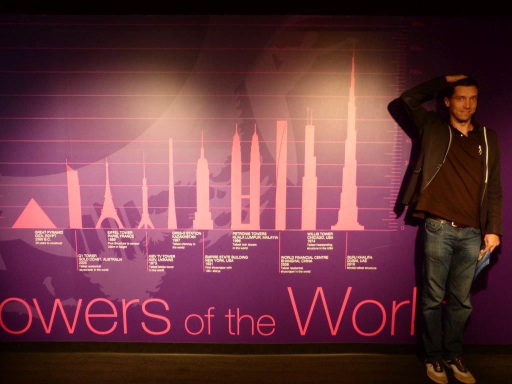 Tim at a poster with famous towers at the Sydney Tower Eye exhibition at the Sydney Tower