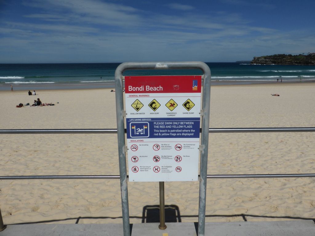 Sign with warnings and regulations at Bondi Beach