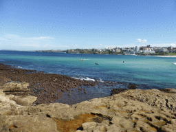 Surfers and the southwest side of Bondi Beach, viewed from the North Bondi Rocks
