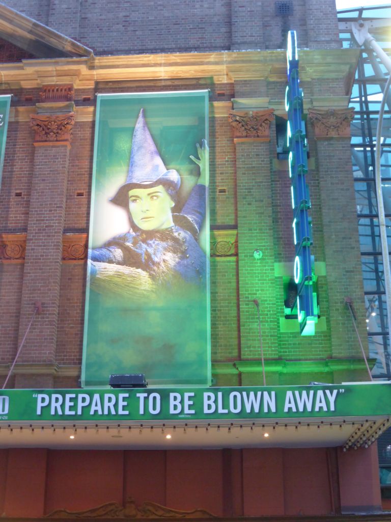 Poster of the musical `Wicked` at the front of the Capitol Theatre at Campbell Street, at sunset