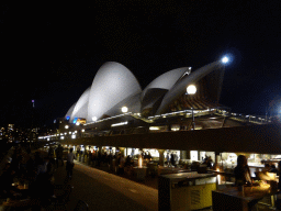 The Lower Concourse of the Sydney Opera House and the southwest side of the Sydney Opera House, by night