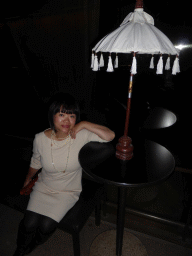 Miaomiao at a table in the Lobby of the Joan Sutherland Theatre at the Sydney Opera House, just before the musical `The King and I` by Rodgers and Hammerstein
