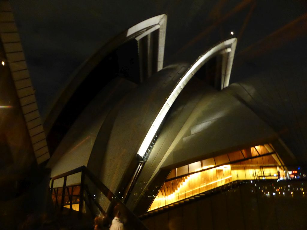 The northwest side of the Sydney Opera House, viewed from the Northern Foyer of the Joan Sutherland Theatre at the Sydney Opera House, by night