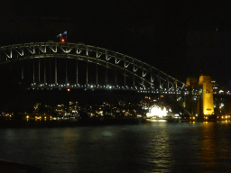 The Sydney Cove, the Sydney Harbour Bridge and Luna Park Sydney, viewed from the Northern Foyer of the Joan Sutherland Theatre at the Sydney Opera House, by night