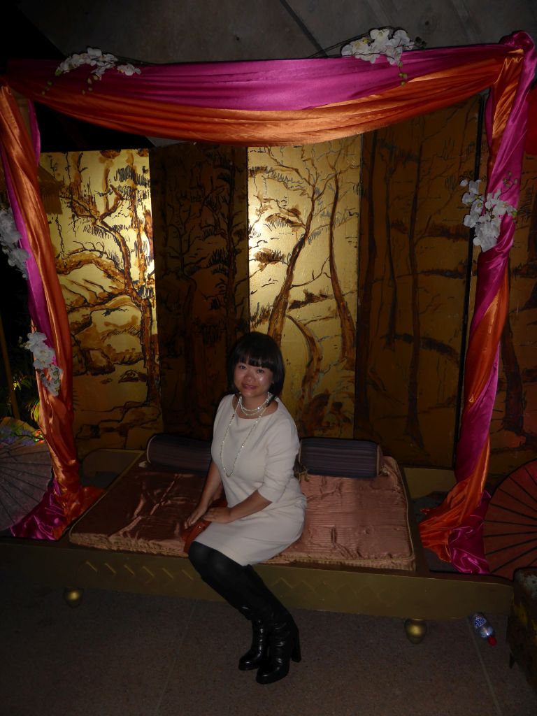 Miaomiao on a bed in the Lobby of the Joan Sutherland Theatre at the Sydney Opera House, just after the musical `The King and I` by Rodgers and Hammerstein