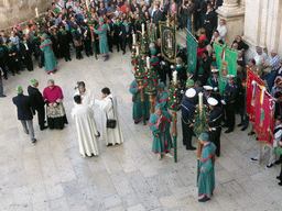 People preparing for the procession during the feast of St. Lucy in front of the Chiesa di Santa Lucia alla Badia church at the Piazza Duomo Square, viewed from the balcony of the Palazzo Borgia del Casale palace