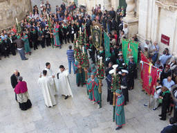 People preparing for the procession during the feast of St. Lucy in front of the Chiesa di Santa Lucia alla Badia church at the Piazza Duomo Square, viewed from the balcony of the Palazzo Borgia del Casale palace