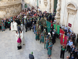 People preparing for the procession during the feast of St. Lucy in front of the Chiesa di Santa Lucia alla Badia church at the Piazza Duomo Square, viewed from the balcony of the Palazzo Borgia del Casale palace