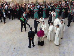 Officials and priests preparing for the procession during the feast of St. Lucy at the Piazza Duomo Square, viewed from the balcony of the Palazzo Borgia del Casale palace