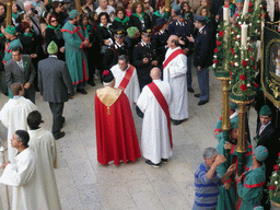 Priests preparing for the procession during the feast of St. Lucy at the Piazza Duomo Square, viewed from the balcony of the Palazzo Borgia del Casale palace