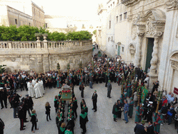 Relics of St. Lucy carried around in the procession during the feast of St. Lucy in front of the Chiesa di Santa Lucia alla Badia church at the Piazza Duomo Square, viewed from the balcony of the Palazzo Borgia del Casale palace