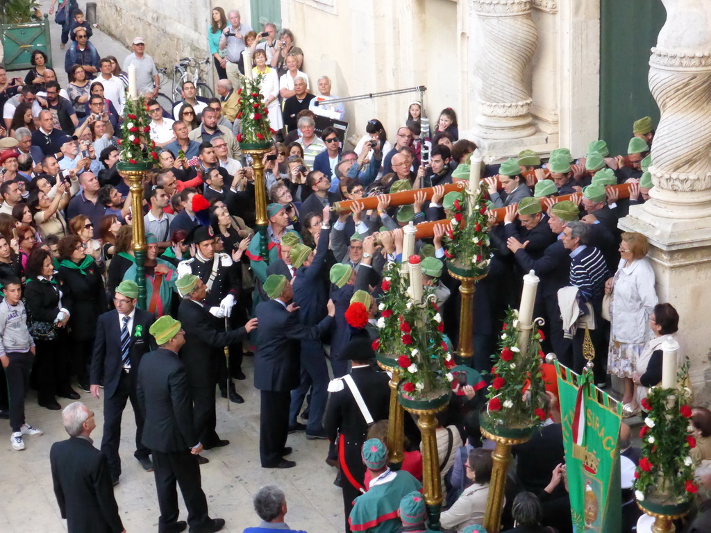 Statue of St. Lucy carried out of the Chiesa di Santa Lucia alla Badia church at the Piazza Duomo Square during the feast of St. Lucy, viewed from the balcony of the Palazzo Borgia del Casale palace