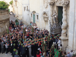 Statue of St. Lucy carried out of the Chiesa di Santa Lucia alla Badia church at the Piazza Duomo Square during the feast of St. Lucy, viewed from the balcony of the Palazzo Borgia del Casale palace