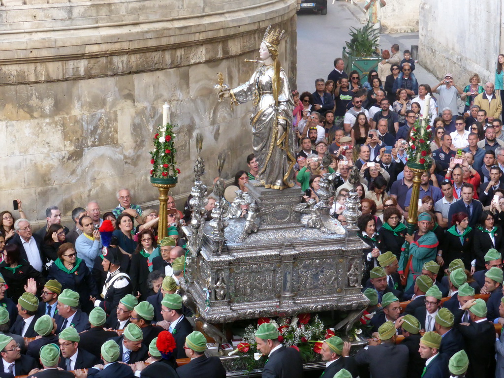 Statue of St. Lucy carried around in the procession during the feast of St. Lucy at the Piazza Duomo Square, viewed from the balcony of the Palazzo Borgia del Casale palace